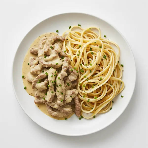 Beef strips in mustard cream sauce with lingunie pasta